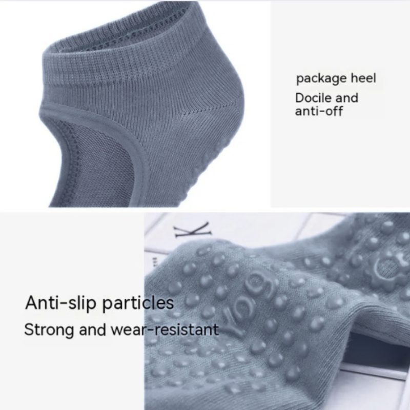 Gray ankle sock with anti-slip particles and package heel feature on a white background